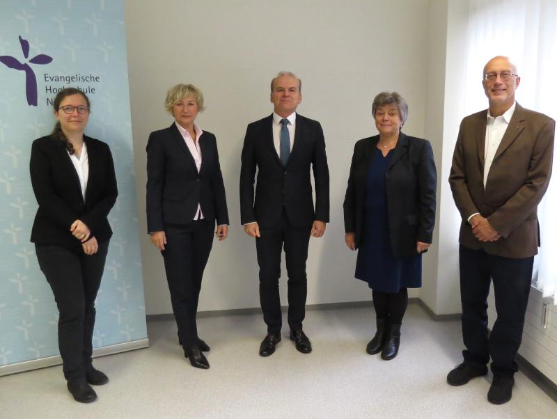 Foto mit vier Personen, Dr. Rolf-Dieter Jungk